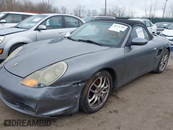 2003 Porsche Boxster with VIN WP0CA29813U621288, listed as a IAAI auction lot 41471740 with 107,864 mi miles. Bid and sale history available at carsss.com. Image 2.