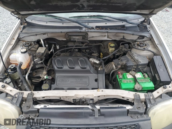 2004 Ford Escape with VIN 1FMCU02144KB63439, listed as a Copart auction lot 85310514 with 275,625 mi miles and Salvage title. Bid and sale history available at DreamBid. Image 12.