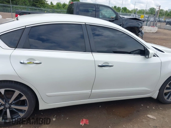 2016 Nissan Altima S z VIN 1N4AL3AP0GC174433, wystawiony jako IAAI lot #42257840 z przebiegiem 122 158 mil mil oraz . Historia ofert i sprzedaży dostępna na DreamBid. Obrazek 14.