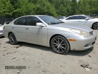 2002 Lexus ES 300 with VIN JTHBF30G520020588, listed as a Copart auction lot 59204865 with 218,670 mi miles and Salvage title. Bid and sale history available at DreamBid. Image 4.