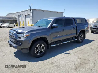 2016 Toyota Tacoma SR with VIN 3TMCZ5ANXGM003814, listed as a Copart auction lot 64827295 with 64,125 mi miles and Salvage title. Bid and sale history available at DreamBid. Image 1.