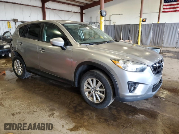 2014 Mazda CX-5 Touring z VIN JM3KE4CY5E0393463, wystawiony jako Copart lot #57776665 z przebiegiem 91 565 mil mil oraz Szkoda całkowita • Salvage title. Historia ofert i sprzedaży dostępna na DreamBid. Obrazek 4.