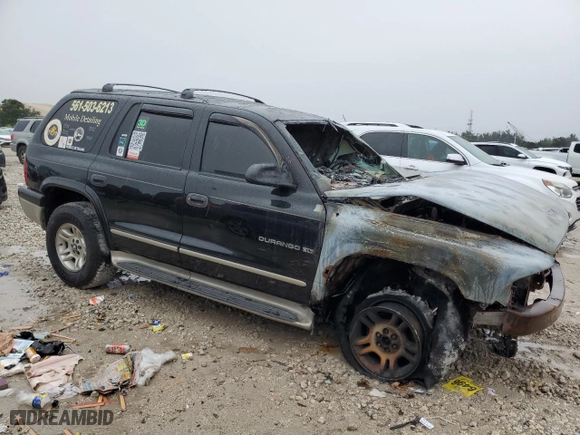 2001 Dodge Durango with VIN 1B4HS28N61F534687, listed as a Copart auction lot 87859635 with 0 mi miles and Salvage Title. Bid and sale history available at carsss.com. Image 4.