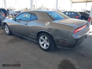 2011 Dodge Challenger with VIN 2B3CJ4DG0BH515573, listed as a IAAI auction lot 41861915 with 133,199 mi miles. Bid and sale history available at carsss.com. Image 3.