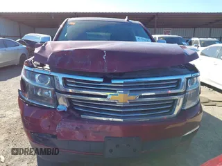 2016 Chevrolet Tahoe LTZ z VIN 1GNSKCKC9GR205745, wystawiony jako IAAI lot #41710241 z przebiegiem 94 931 mil mil oraz . Historia ofert i sprzedaży dostępna na DreamBid. Obrazek 12.