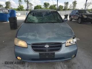 2000 Nissan Maxima GXE with VIN JN1CA31A1YT223132, listed as a Copart auction lot 60148655 with 269,258 mi miles and Salvage title. Bid and sale history available at DreamBid. Image 5.