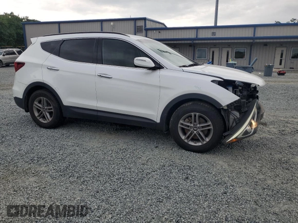 2018 Hyundai Santa Fe 2.4L z VIN 5NMZU3LB6JH104469, wystawiony jako Copart lot #57587495 z przebiegiem 78 267 mil mil oraz Szkoda całkowita • Salvage title. Historia ofert i sprzedaży dostępna na DreamBid. Obrazek 4.