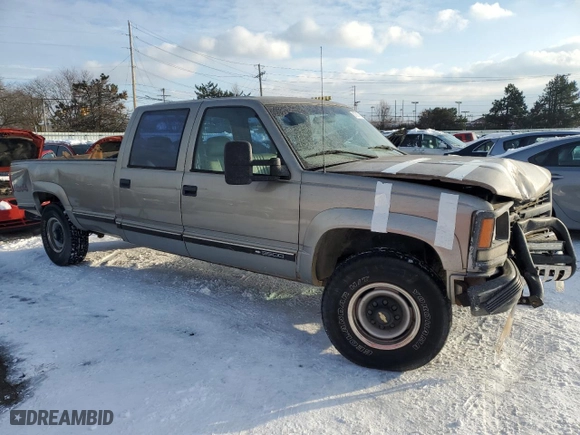 1999 Chevrolet C/K 3500 Crew Cab with VIN 1GCHK33R4XF096473, listed as a Copart auction lot 87587465 with NaN miles and Salvage Title. Bid and sale history available at carsss.com. Image 4.