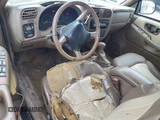 1999 Chevrolet Blazer LS z VIN 1GNCS13W0X2133425, wystawiony jako Copart lot #81930324 z przebiegiem 224 669 mil mil oraz Szkoda całkowita • Salvage title. Historia ofert i sprzedaży dostępna na DreamBid. Obrazek 8.