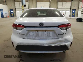 2021 Toyota Corolla Hybrid LE with VIN JTDEAMDE4MJ002382, listed as a Copart auction lot 50318865 with 74,385 mi miles and Salvage Title. Bid and sale history available at carsss.com. Image 6.