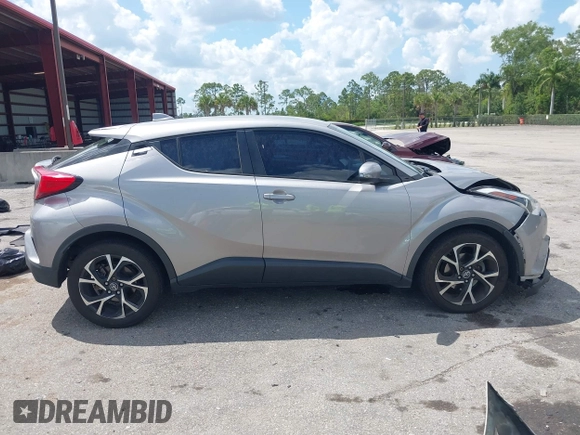 2019 Toyota C-HR XLE with VIN NMTKHMBX8KR093044, listed as a IAAI auction lot 41939036 with 60,130 mi miles. Bid and sale history available at carsss.com. Image 13.