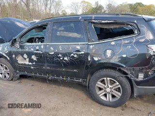 2016 Chevrolet Traverse LT z VIN 1GNKRHKD9GJ324797, wystawiony jako IAAI lot #41891336 z przebiegiem 132 234 mil mil oraz . Historia ofert i sprzedaży dostępna na DreamBid. Obrazek 6.