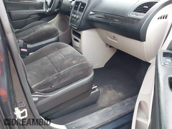 2013 Dodge Grand Caravan SXT with VIN 2C4RDGCGXDR749803, listed as a IAAI auction lot 42118722 with 264,454 mi miles and . Bid and sale history available at DreamBid. Image 5.