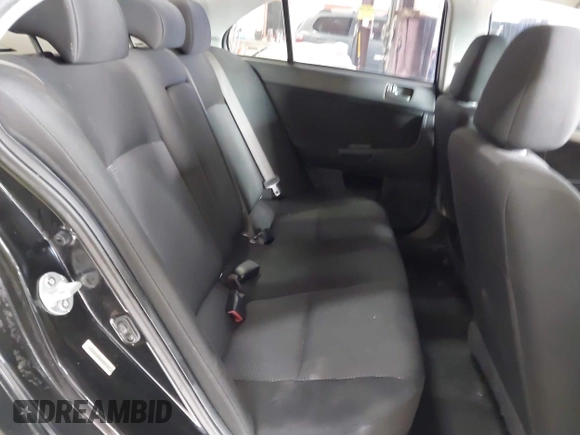 2008 Mitsubishi Lancer DE with VIN JA3AU26UX8U015865, listed as a IAAI auction lot 41108329 with 131,884 mi miles. Bid and sale history available at carsss.com. Image 8.