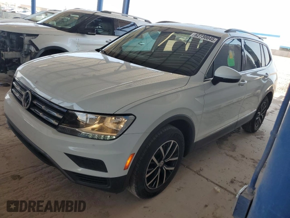 2021 Volkswagen Tiguan SE z VIN 3VV3B7AX5MM010006, wystawiony jako Copart lot #62730045 z przebiegiem 49 288 mil mil oraz Szkoda całkowita • Salvage title. Historia ofert i sprzedaży dostępna na DreamBid. Obrazek 1.