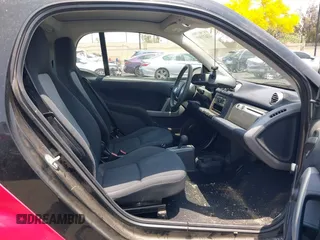 2014 Smart fortwo Pure z VIN WMEEJ3BAXEK744079, wystawiony jako IAAI lot #42421069 z przebiegiem 79 788 mil mil oraz . Historia ofert i sprzedaży dostępna na DreamBid. Obrazek 8.