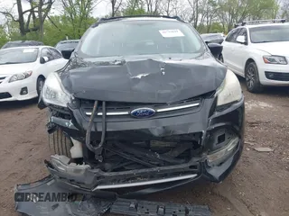 2013 Ford Escape SE with VIN 1FMCU0GX6DUC98598, listed as a IAAI auction lot 42133641 with 174,111 mi miles and . Bid and sale history available at DreamBid. Image 12.