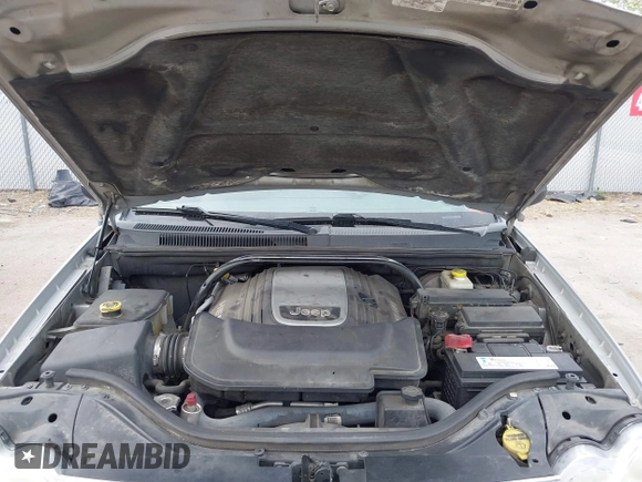 2005 Jeep Grand Cherokee Limited with VIN 1J4HR58255C671885, listed as a IAAI auction lot 42136640 with 215,751 mi miles. Bid and sale history available at carsss.com. Image 10.