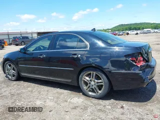 2005 Acura RL z VIN JH4KB16505C001925, wystawiony jako IAAI lot #42435200 z przebiegiem 154 217 mil mil oraz . Historia ofert i sprzedaży dostępna na DreamBid. Obrazek 14.