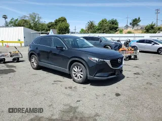 2017 Mazda CX-9 Sport z VIN JM3TCABY6H0131479, wystawiony jako Copart lot #57178805 z przebiegiem 98 698 mil mil oraz Szkoda całkowita • Salvage title. Historia ofert i sprzedaży dostępna na DreamBid. Obrazek 14.