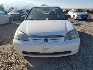2002 Honda Civic z VIN 1HGEN26532L000390, wystawiony jako Copart lot #80095344 z przebiegiem 162 638 mil mil oraz Czysty tytuł • Clean title. Historia ofert i sprzedaży dostępna na DreamBid. Obrazek 5.
