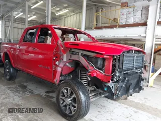 2022 Ram 2500 Longhorn z VIN 3C6UR5GL2NG130702, wystawiony jako IAAI lot #42001500 z przebiegiem 69 246 mil mil oraz . Historia ofert i sprzedaży dostępna na DreamBid. Obrazek 1.