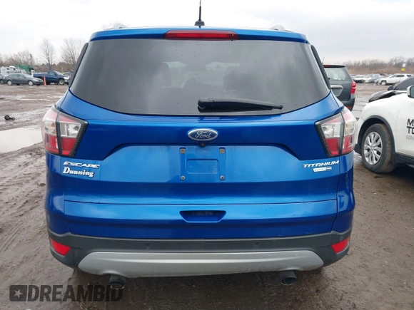 2017 Ford Escape Titanium with VIN 1FMCU9JD8HUA59000, listed as a IAAI auction lot 41559788 with 90,319 mi miles. Bid and sale history available at carsss.com. Image 16.