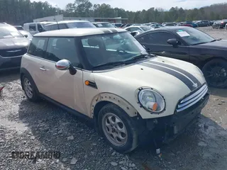 2012 MINI Hardtop with VIN WMWSU3C53CT185697, listed as a IAAI auction lot 41761981 with 201,335 mi miles and . Bid and sale history available at DreamBid. Image 1.