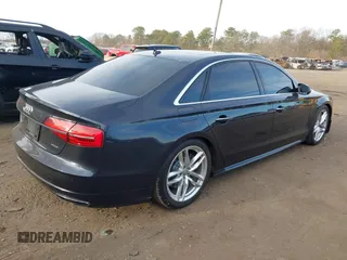 2017 Audi A8 L with VIN WAU44AFDXHN006857, listed as a IAAI auction lot 41758062 with 88,385 mi miles. Bid and sale history available at carsss.com. Image 4.