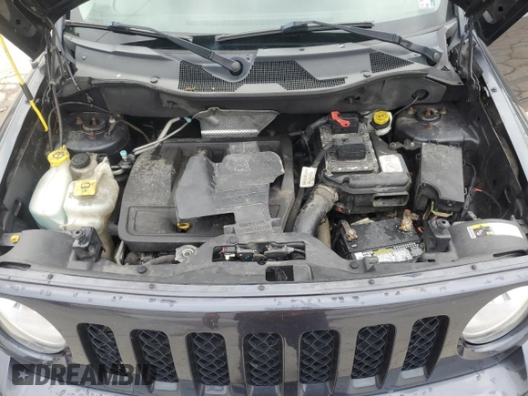 2014 Jeep Patriot Latitude with VIN 1C4NJRFB0ED649779, listed as a Copart auction lot 60444435 with 161,009 mi miles and Salvage title. Bid and sale history available at DreamBid. Image 12.