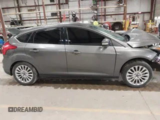 2012 Ford Focus Titanium with VIN 1FAHP3N27CL313288, listed as a IAAI auction lot 41741895 with 140,376 mi miles and . Bid and sale history available at carsss.com. Image 14.