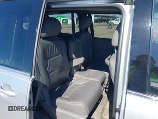 2010 Honda Odyssey Touring with VIN 5FNRL3H97AB015472, listed as a IAAI auction lot 41763680 with 144,309 mi miles. Bid and sale history available at carsss.com. Image 8.