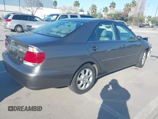 2005 Toyota Camry LE with VIN 4T1BF30K55U619313, listed as a IAAI auction lot 41854001 with 89,982 mi miles and . Bid and sale history available at DreamBid. Image 4.