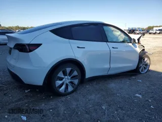 2023 Tesla Model Y Long Range z VIN 7SAYGAEE1PF810888, wystawiony jako Copart lot #88991735 z przebiegiem Nie podano mil oraz Nie do naprawy • Non repairable. Historia ofert i sprzedaży dostępna na DreamBid. Obrazek 3.