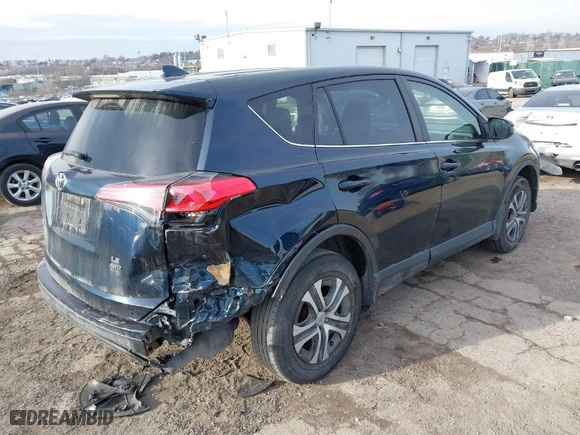 2018 Toyota RAV4 LE with VIN JTMBFREV5JD253342, listed as a IAAI auction lot 41656581 with 243,791 mi miles. Bid and sale history available at carsss.com. Image 4.