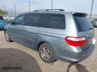 2007 Honda Odyssey EX-L with VIN 5FNRL38617B021850, listed as a IAAI auction lot 41852809 with 136,892 mi miles. Bid and sale history available at carsss.com. Image 3.