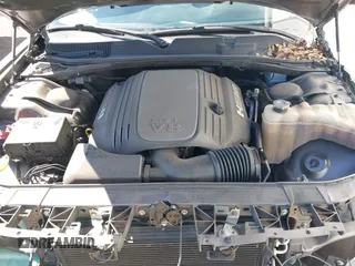 2017 Dodge Challenger R/T Plus with VIN 2C3CDZBT8HH600032, listed as a IAAI auction lot 42173591 with 92,303 mi miles and . Bid and sale history available at DreamBid. Image 10.