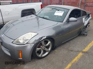 2006 Nissan 350Z Touring z VIN JN1AZ34D56M331590, wystawiony jako IAAI lot #42361928 z przebiegiem Nie podano mil oraz . Historia ofert i sprzedaży dostępna na DreamBid. Obrazek 2.
