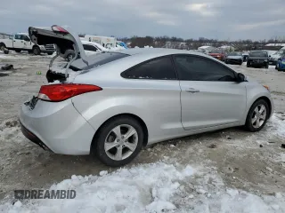 2013 Hyundai Elantra Coupe SE with VIN KMHDH6AE4DU018471, listed as a Copart auction lot 88840905 with 100,836 mi miles and Salvage Title. Bid and sale history available at carsss.com. Image 3.