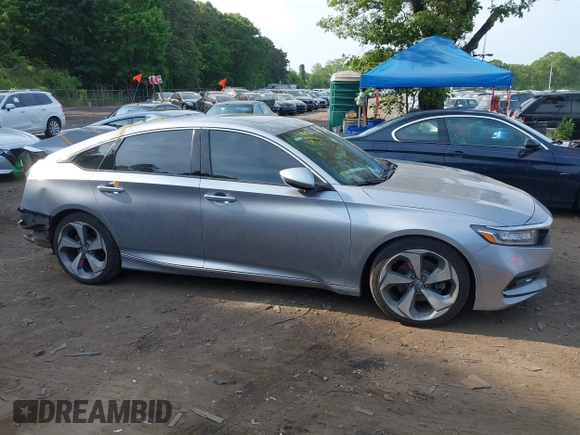 2020 Honda Accord Touring z VIN 1HGCV2F93LA017701, wystawiony jako IAAI lot #42383938 z przebiegiem 40 945 mil mil oraz . Historia ofert i sprzedaży dostępna na DreamBid. Obrazek 13.
