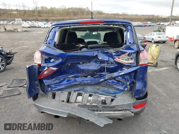 2015 Ford Escape SE with VIN 1FMCU9GX4FUC73125, listed as a IAAI auction lot 42071815 with 71,681 mi miles. Bid and sale history available at carsss.com. Image 16.