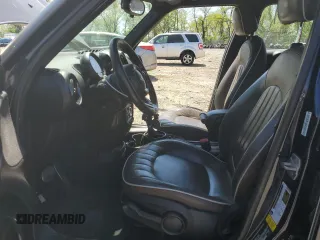 2015 MINI Countryman S with VIN WMWZC3C52FWT05882, listed as a Copart auction lot 54399525 with 125,971 mi miles and Salvage title. Bid and sale history available at DreamBid. Image 7.