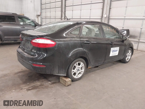 2014 Ford Fiesta SE with VIN 3FADP4BJ9EM212156, listed as a IAAI auction lot 41791690 with 92,760 mi miles and . Bid and sale history available at DreamBid. Image 4.