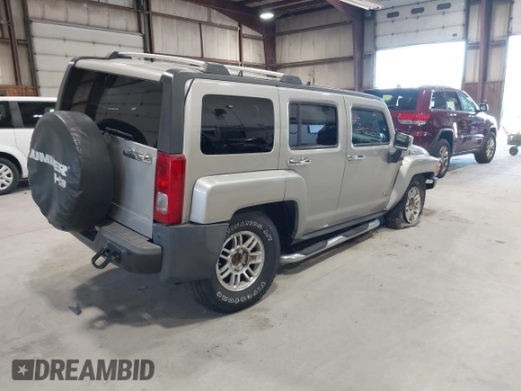 2006 Hummer H3 with VIN 5GTDN136268123052, listed as a IAAI auction lot 42126283 with 124,040 mi miles. Bid and sale history available at carsss.com. Image 4.