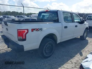2015 Ford F-150 XLT with VIN 1FTEW1EF2FFC58131, listed as a IAAI auction lot 40736696 with 194,852 mi miles. Bid and sale history available at carsss.com. Image 4.