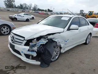 2009 Mercedes-Benz C-Class 3.0L Sport with VIN WDDGF54X39R050407, listed as a IAAI auction lot 42105946 with 197,471 mi miles. Bid and sale history available at carsss.com. Image 2.