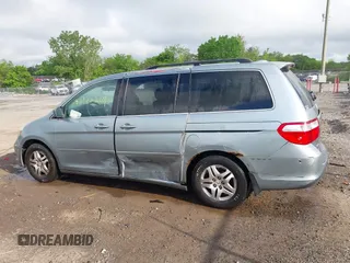 2007 Honda Odyssey EX-L z VIN 5FNRL38717B002725, wystawiony jako IAAI lot #42177209 z przebiegiem 226 706 mil mil oraz . Historia ofert i sprzedaży dostępna na DreamBid. Obrazek 14.