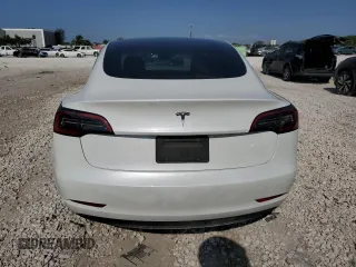 2023 Tesla Model 3 with VIN 5YJ3E1EA6PF510323, listed as a Copart auction lot 52094495 with 115,928 mi miles and Salvage Title. Bid and sale history available at DreamBid. Image 6.