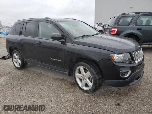 2014 Jeep Compass High Altitude with VIN 1C4NJCEAXED679345, listed as a Copart auction lot 85058994 with 153,973 mi miles and Non Repairable. Bid and sale history available at carsss.com. Image 4.