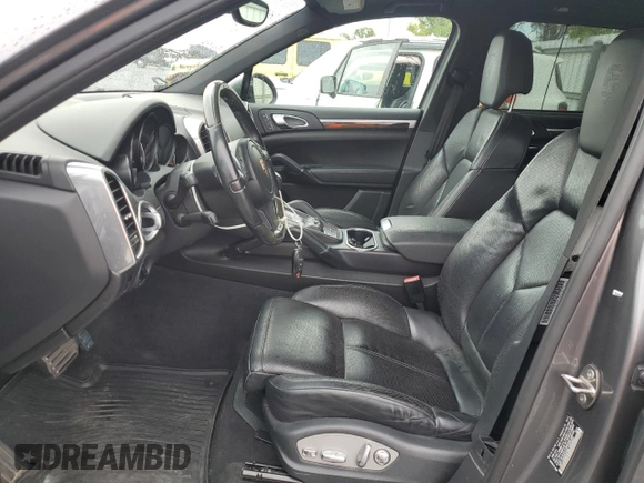 2011 Porsche Cayenne S with VIN WP1AB2A2XBLA55565, listed as a Copart auction lot 63094305 with 105,250 mi miles and Salvage title. Bid and sale history available at DreamBid. Image 7.